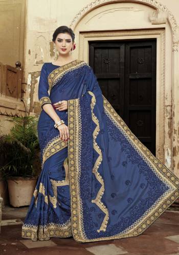 Grab This Saree In Blue Color Paired With Blue Colored Blouse Which Will Give An Immense Look To Your Personality. This pretty Saree Is Fabricated On Soft Silk Paired With Art Silk Fabricated Blouse. Buy This Designer Saree Now.