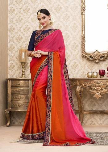 When Two Bright Colors Meets Together Makes A Beautiful Combination, Grab This Saree In Pink and Orange Color Paired With Contrasting Navy Blue Colored Blouse. This Saree Is Fabricated On Chiffon Paired With Art Silk Fabricated Blouse. Buy This Saree Now.