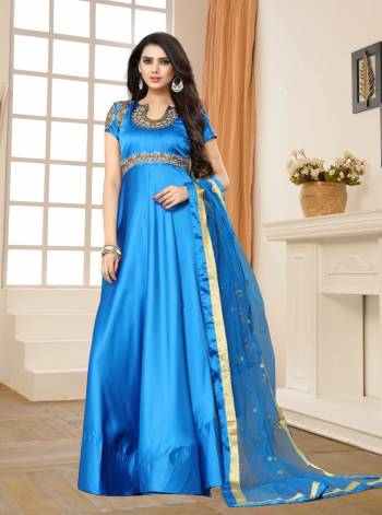 Grab This Designer Floor Length Suit In Blue Color Paired With Blue Colored Bottom And Dupatta. Its Top Is Fabricated On Satin Silk Paired With Santoon Bottom And Net Dupatta. Its Fabrics Are Soft Towards Skin And Easy To Carry All Day Long.