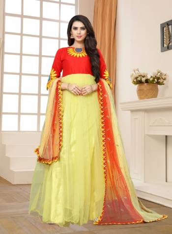 Adorn The Pure Tradtional Look Wearing This Floor Length Suit In Yellow And Red Color Paired With Yellow Colored Bottom And Yellow And Red Dupatta. Its Top And Dupatta Are Fabricated On Net Paired With Santoon Bottom. Buy This Light Weight Suit Now.