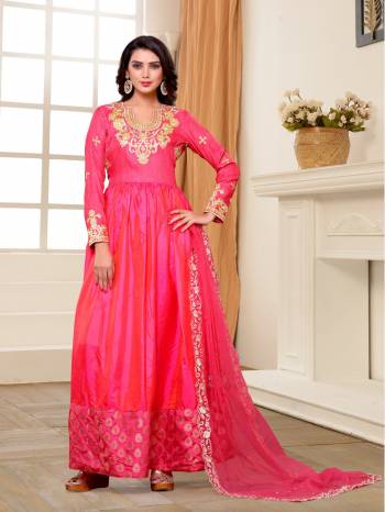 Bright And Visually Appealing Color Is Here With This Floor Length Suit In Fuschia Pink Color Paired With Fuschia Pink Colored Bottom And Dupatta. Its Top Is Fabricated On Art Silk Paired With Santoon Bottom And Net Dupatta. Buy This Suit Now.