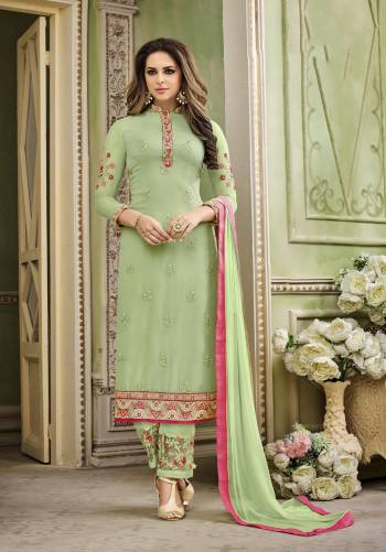 Look Pretty In Thi Lovely Pastel Shade Of Green With This Designer Straight Cut Suit In Pastel Green Color Paired With Pastel Green Colored Bottom And Dupatta. Its Top Is Fabricated On Georgette Paired With Santoon Bottom And Chiffon Dupatta. 