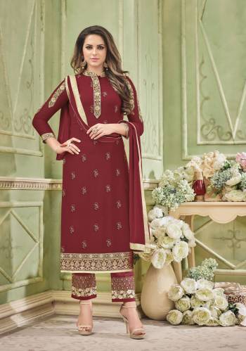 Royal Looking Straight Cut Suit Is Here In Maroon Color Paired With Maroon Colored Bottom And Dupatta. Its Top Is Fabricated On Georgette Paired With Santoon Bottom And Chiffon Dupatta. It Top And Bottom Are Beautified With Embroidery Making The Suit Designer And Attractive. Buy It Now. 