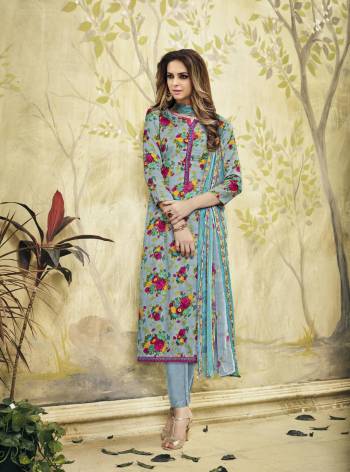 Go Floral With This Dress Material In Light Blue Color Paired With Light Blue Colored Bottom And Dupatta. It Top And Bottom Are Fabricated On Cotton Paired With Chiffon Dupatta Beautified With Bold Multi Colored Floral Prints. Buy This Now.