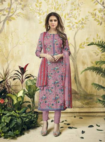 New Shade Is Here With This Dress Material In Mauve Color Paired With Mauve Colored Bottom And Dupatta. Its Top And Bottom Are Fabricated On Cotton Paired With Chiffon Dupatta.This Suit Is Light Weight And Easy To Carry All Day Long. Buy Now. 