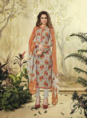 Simple And Elegant Color Is Here With This Dress Material In Grey Color Paired With Grey Colored Bottom And Dupatta. Its Top And Bottom Are Fabricated On Cotton Paired With Chiffon Dupatta. It Is Beautified With Floral Prints All Over. Buy Now.