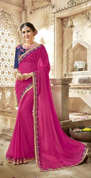 Look Pretty Wearing This Saree In Pink Color Paired With Contrasting Navy Blue Colored Blouse. This Saree Is Fabricated On Georgette Paired With Art Silk Fabricated Blouse. It Is Beautified With Embroidered Lace Border And Blouse. Buy Now.