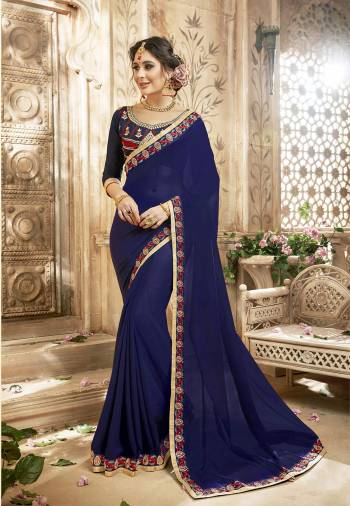 Earn Lots Of Compliments Wearing This Saree In Blue Color Paired With Blue Colored Blouse. This Saree Is Fabricated On Georgette Paired With Art Silk Fabricated Blouse. It Is Light Weight, Durable And Easy To Carry All Day Long.