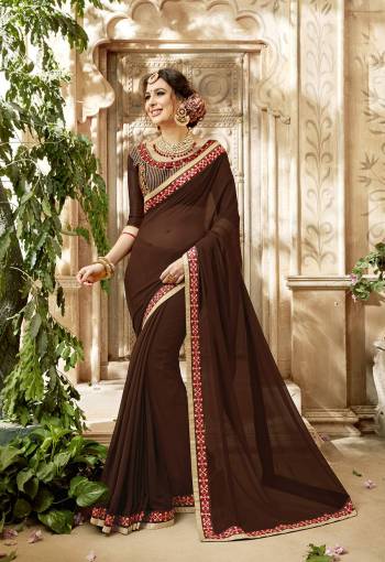 Enhance Your Personality Wearing This Saree In Brown Color Paired With Brown Colored Blouse. This Saree Is Fabricated On Georgette Paired With Art silk Fabricated Blouse. Also This Saree Will Defenitely Earn You Lots Of Compliments From Onlookers. Buy Now.