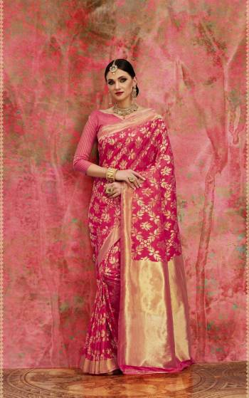 Look Pretty Wearing This Lovely Pink Colored Silk Saree Paired With Pink Colored Blouse. This Saree And Blouse Are Fabricated On Banarasi Art Silk Beautified With Weave All Over. It Will Give You An Attractive Look Like Never Before.