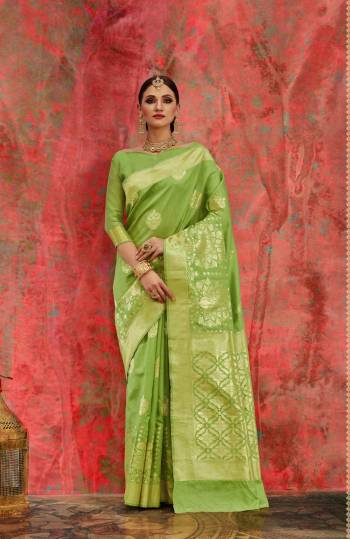 Very Pretty Shade Of Green Is Here With This Saree In Light Green Color Paired With Light Green Colored Blouse. This Saree And Blouse Are Fabricated On Banarasi Art Silk Beautified With Weave All Over It. Its Subtle Color Will Give A Very Pretty Look.