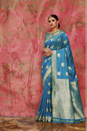 Look Pretty Wearing This Saree In Blue Color Paired Withurquoise Blue Colored Blouse. This Saree And Blouse Are Fabricated On Banarasi Art Silk. This Saree Gives You Rich Look To Your Personality. Buy Now.