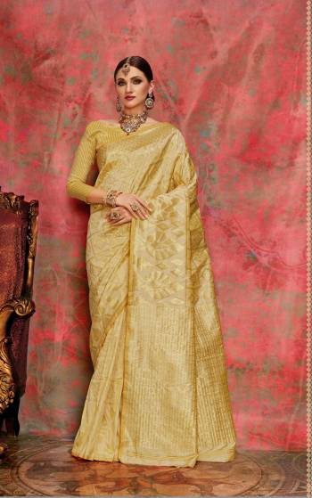 Simple and Elegant Looking Saree Is Here In Beige Color Paired With Beige Colored Blouse. This Saree And Blouse Are Fabricated On Banarasi Art Silk. Also Its Color Will Give A Rich And Elegant Look To Your Personality.