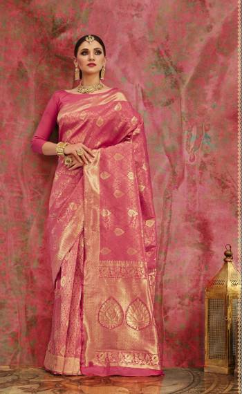 Look Pretty Wearing This Lovely Pink Colored Silk Saree Paired With Pink Colored Blouse. This Saree And Blouse Are Fabricated On Banarasi Art Silk Beautified With Weave All Over. It Will Give You An Attractive Look Like Never Before.