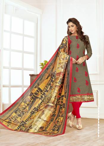 Elegant Looking Dress Material Is Here In Grey Colored Top Paired With Contrasting Red Colored Bottom And Multi Colored Dupatta. Its top And Bottom Are Fabricated On Cotton Paired With Cotton Silk Dupatta. It Has Digital Print Over The Dupatta And Thread Work On Top.