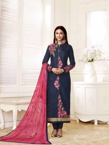 Enhance Your Personality Wearing This Straight Cut Suit In Navy Blue Color Paired With Navy Blue Colored Bottom And Pink Colored Dupatta. Its Top Is Fabricated On Art Silk Paired With Santoon Bottom And Chiffon Dupatta. It Is Beautified With Multi Colored Thread Embroidery Over the Top And Dupatta. 