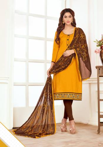 Grab This Dress Material In Musturd Yellow Color Paired With Contrasting Brown Colored Bottom And Dupatta. Its Top And Bottom Are Fabricated On Cotton Paired With Chiffon Dupatta. This Lovely Combination Is evergreen And Also Earn You Lots Of Compliments From Onlookers. Buy It Now.