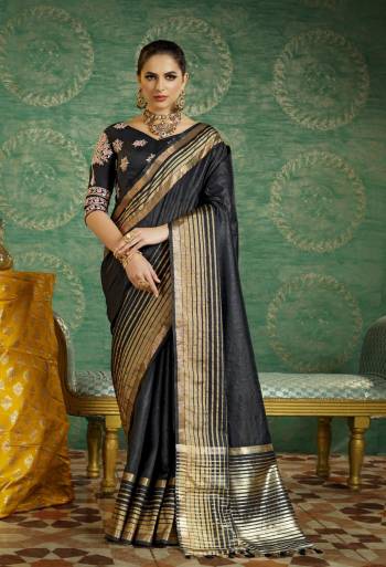 Enhance Your Beauty Wearing This Designer Saree In Dark Grey Color Paired With Dark Grey Colored Blouses. This Saree Is Fabricated On Handloom Art Silk Paired With One Running Blouse And Another Embroidered Blouse Fabricated On Art Silk. This Saree Will Give A Rich Look Like Never Before.