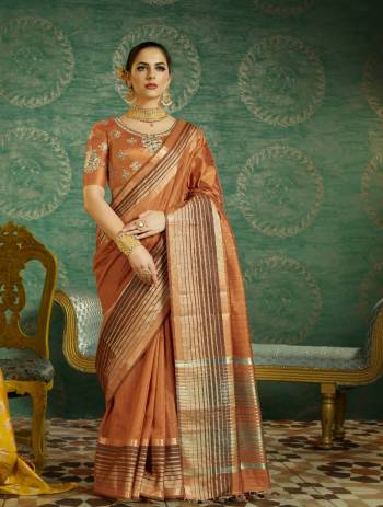 New And Unique Rich Shade Is Here With This Designer Saree In Rust Orange Color Paired With Rust Orange Colored Two Blouses. Its One Blouse Is Running Fabricated On Handloom Art Silk And Another Is Embroidred Fabricated On Art Silk. Both The Blouses Give A Very Rich Look To Your Personality. Buy It Now.