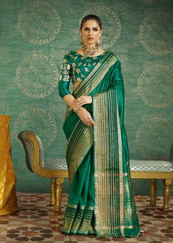 Buy This Beautiful Designer Saree In Pine Green Color Which Comes With Two Blouses, Both In Pine Green Color. One Of The Blouse Has Running Fabric Of Saree That Is Handloom Art Silk And Another Is Fabricated On Art Silk Beautified With Embroidery. Buy This Lovely Saree Now.