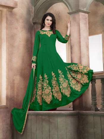 Add This Green Colored Designer Floor Length Suit To Your Wardrobe Paired With Green Colored Bottom And Dupatta. Its Top Is Fabricated On Georgette Paired With Santoon Bottom And Chiffon Dupatta. It Is Light Weight And Easy To Carry All Day Long.