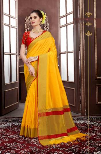 Adorn The Pure Traditonal Look Wearing This Lovely Saree In Yellow Color Paired With Contrasting Red Colored Blouse. This Saree Is Fabricated On Handloom Weaving Silk Paired With Art Silk Fabricated Blouse. Buy This Saree Now.