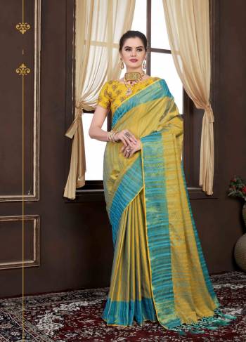 Celebrate This Festive Season Wearing This Saree In Yellow And Blue Color Paired With Yellow Colored Blouse. This Saree Is Fabricated On Handllom Weaving Silk Paired With Art Silk Fabricated Blouse. Buy This Saree Now.