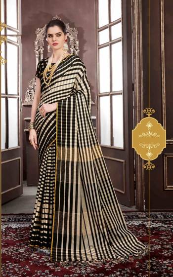 Get Ready For The Next Formal Fucntion At Your Place Wearing This Saree In Black And Cream Color Paired With Black Colored Blouse. This Saree Is Fabricated On Handloom Weving Silk Paired With Art Silk Fabricated Blouse. Buy This Saree Now.