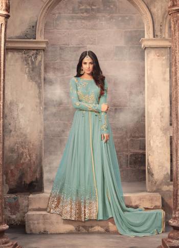 Another Color Is Available In Designer Floor Length Suit In Light Blue Color Paired With Light Blue Colored Bottom And Dupatta. Its Top Is Fabricated On Net Paired With Santoon Bottom And Chiffon Dupatta. Its Attractive Sequence Work Over The Panel Is Giving The Suit Quite Unique Look.