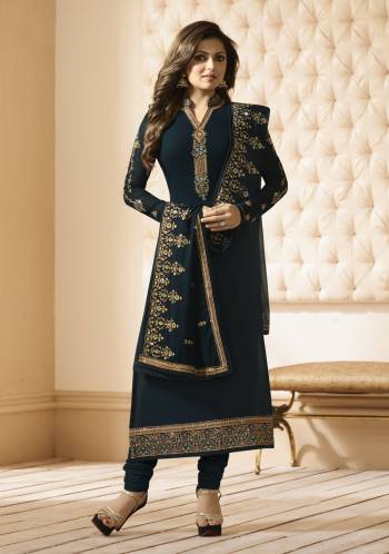 Add This Bold And Beautiful New Shade To Your Wardrobe In Prussian Blue Colored Designer Straight Cut Suit Paired With Prussian Blue Colored Bottom And Dupatta. Its Top Is Fabricated On Georgette Paired With Santoon Bottom And Georgette Dupatta. Its Top and dupatta Are Beautified With Embroidery. Buy It Now.