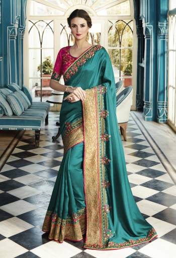 Grab This Beautiful Shade Of Blue With This Teal Blue Colored Saree Paired With Contrasting Dark Pink Colored Blouse. This Saree Is Fabricated On Satin Silk Paired With Art Silk Fabricated Blouse. Its Is Beautified With Contrasting Embroidery All Over. Buy Now.