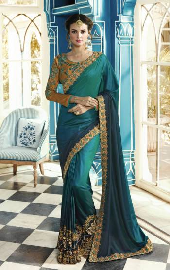 Shades Are In This Season So Grab This Pretty Shaded Saree In Shades Of Blue Paired With Contrasting Musturd Yellow Colored Blouse. This Saree Is Fabricated On Soft Silk Paired With Art Silk Fabricated Blouse. Its Beautiful Color Combination Will Earn You Lots Of Compliments From Onlookers.