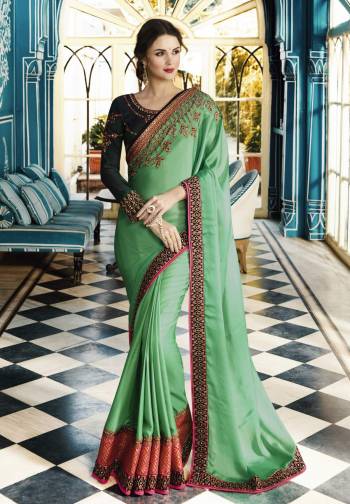 Look Pretty Wearing This Saree In Light Green Color Paired With Contrasting Forest Green Colored Blouse. This Saree Is Fabricated On Soft Silk Paired With Art Silk Fabricated Blouse.  This Saree And Blouse Are Beautified With Multi Colored Embroidery. Buy This Saree Now.