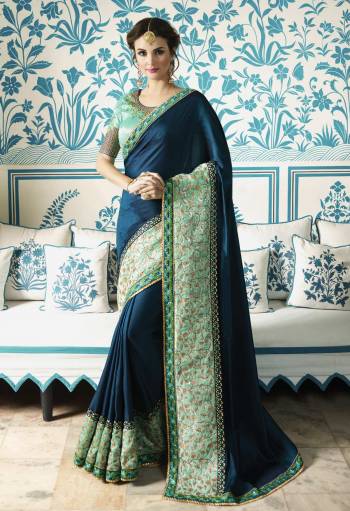 Look Beautiful Wearing This Dark Blue Colored Saree Paired With Light Blue Colored Blouse. This Saree Is Fabricated On Soft Silk Paired With Art Silk Fabricated Blouse. Both The Fabrics Are Light Weight and Easy To Carry All Day Long.