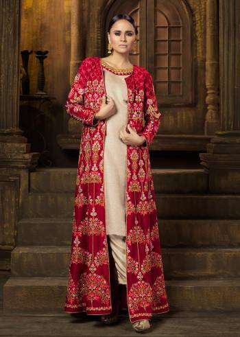 This Wedding Season Catch All The Lime Light Wearing This Designer Suit With Jacket. Its Top Is In Beige Color With Red Colored Jacket And Dupatta. Its Top IS Fabricated On Art Silk With Valvet Fabricated Jacket And Chiffon Dupatta. This Piece Will Definetily Earn You Lots Of Compliments From Onlookers.