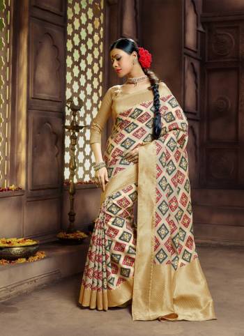 Flaunt Your Rich And Elegant Taste Wearing This Rich Looking Saree In Beige Color Paired With Beige Colored Blouse. This Saree And Blouse Are Fabricated On Banarasi Art Silk Beautified With Weave All Over. Buy This Rich Looking Saree Now.