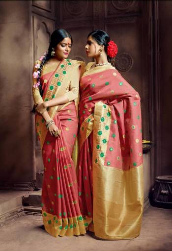 This Festive Season, Flaunt Your Rich And Elegant Side Wearing This Saree In Peach Color Paired With Beige Colored Blouse. This Saree And Blouse Are Fabricated On Banarasi Art Silk. Buy This Pretty Saree Now.