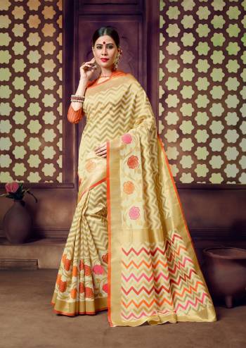 A Womens Personality Reflects In Her Elegance And Grace. So Grab this Elegant Looking Saree In Beige Color Paired With Orange Colored Blouse. This Saree And Blouse Are Fabricated On Banarasi Art Silk With Geometric And Floral Weave.