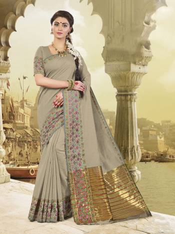 Flaunt Your Rich And Elegant Taste Wearing This Saree In Grey Color Paired With Grey Colored Blouse. This Saree And Blouse Are Fabricated On Cotton Silk. It Is Light Weight And Easy To Carry All Day Long. Also It Will Earn You Lots Of Compliments From Onlookers.