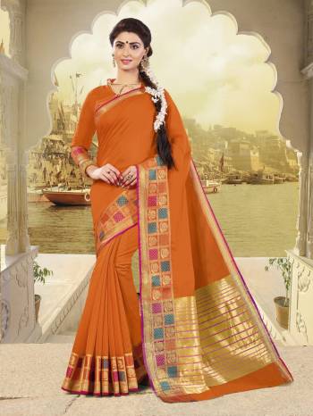 Bright And Visually Appealing Color Is Here With This Saree In Orange Color Paired With Orange Colored Blouse. This Saree And Blouse Are Fabricated On Cotton Silk And Perfect For Your Festive Wear. Buy It Niw.