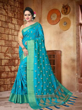 Attract All Wearing This Saree In Blue Color Paired With Beige Colored Blouse. This Saree Is Fabricated On Soft Silk Paired With Art Silk Fabricated Blouse. It Is Beautified With Jari Embroidery. 