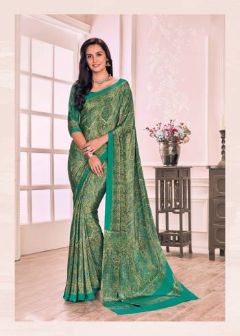 For Your Casual Or Semi-Casual Wear, Grab This Saree In Green Color Paired With Green Colored Blouse. This Saree And Blouse Are Fabricated On Crepe Beautified With Small Prints All It. It Is Light Weight And Easy To Drape.