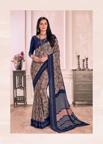 Rich And Simple Saree Is Here In Grey Color Paired With Contrasting Navy Blue Colored Blouse. This Saree And Blouse are Fabricated On Crepe. This Fabric Is Soft Towards Skin, Light Weight And Easy To Carry All Day Long.