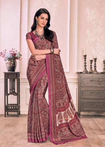 Look Pretty In This Pink Colored Saree Paired With Pink Colored Blouse. This Saree And Blouse Are Fabricated On Crepe Beautified With Prints All Over It. Buy This Saree Now.