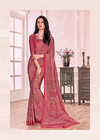 Look Pretty In This Pink Colored Saree Paired With Pink Colored Blouse. This Saree And Blouse Are Fabricated On Crepe Beautified With Prints All Over It. Buy This Saree Now.