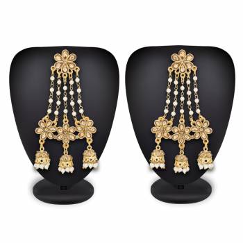 Grab This Beautiful Pair Of Earrings In Golden Color That Can Be Paired With Any Colored Traditonal Attire As It Is Beautified With Beige Colored Stone And White Colored Pearl. Buy This Earrings Set Now.