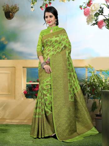 Look Pretty Wearing This Saree In Green Color Paired With Green Colored Blouse. This Saree And Blouse Are Fabricated On Art Silk. Its Color And Fabric Gives You A Rich Look Like Never Before.