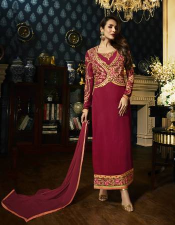 Look Beautiful Wearing This Designer Straight Cut Suit In Dark Pink Color Paired With Dark Pink Colored Bottom And Dupatta. Its Top Is Fabricated On Georgette Paired With Santoon Bottom And Chiffon Dupatta. It Has Heavy Embroidery Making The Suit Attractive. Buy Now.