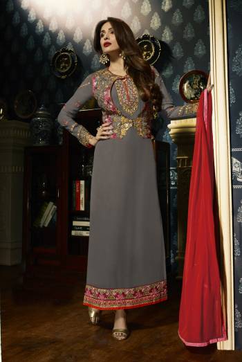 Flaunt Your Rich And Elegant Taste wearing This Designer Straight Cut Suit In Grey Color paired With Grey Colored Bottom and Red Colored Dupatta. Its Top Is Fabricated On Georgette Paired With Santoon Bottom And Chiffon Dupatta. Its all Three Fabrics Ensures Superb Comfort All Day Long.