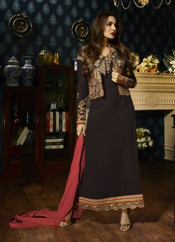 Enhance Your Personality Wearing This Designer Staright Cut Suit In Dark Brown Color Paired With Dark Brown Colored Bottom And Contrasting Pink Colored Dupatta. Its Top Is Fabricated On Georgette Paired With Santoon Bottom And Chiffon Dupatta. Buy It Now.